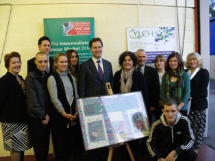 Nick Clegg (centre) meets volunteers at textile re-use project PreFab clothing, Cardiff